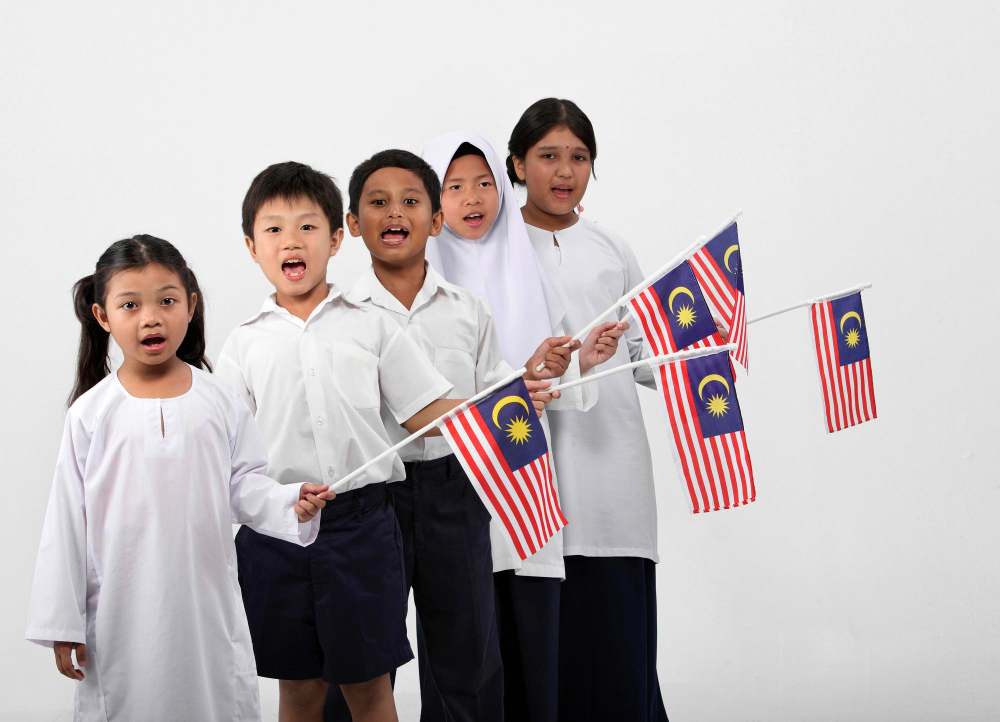 Malaysian school students with flags